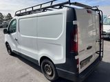 a white van that is parked in a parking lot