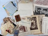 a table with a bunch of old papers on it