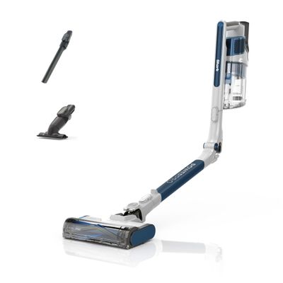 un gros plan sur un aspirateur bleu et blanc et une serpillière noire et blanche