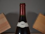 a bottle of wine that is sitting on a table
