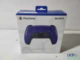 a close up of a box with a game controller inside of it