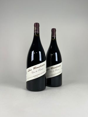 two bottles of red wine sitting next to each other on a table