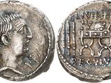 a silver coin with an image of a man on it