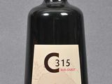 a bottle of wine that is sitting on a table