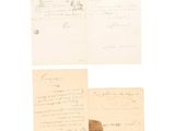 two old papers and a pen on top of a piece of paper