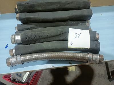 a stack of hoses sitting on top of a table