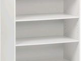 a close up of a white bookcase on a white background