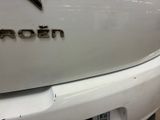 a close up of a white car with the word frozen on it