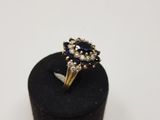a close up of a ring on a black ring holder