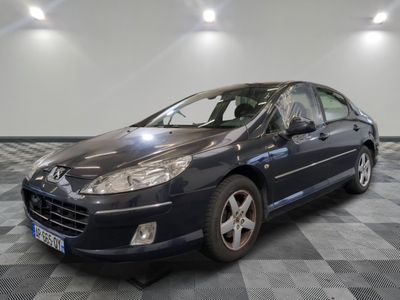 a picture of a blue car parked in a garage
