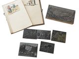 plusieurs livres illustrés représentant des personnes et des animaux, posés sur une table