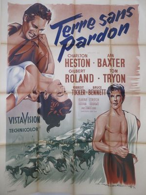 une vieille affiche de cinéma représentant un homme et une femme à cheval