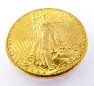 an image of a close up of a gold coin on a white surface