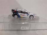 a toy car that is on display on a clear shelf