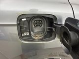 a close up of a car ' s fuel pump at a gas station