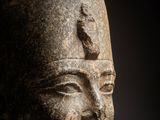 head of a statue of a woman with a crown on it ' s head