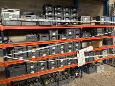 many boxes and boxes on the shelves in the warehouse