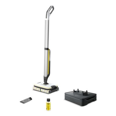 a close up of a vacuum cleaner and other items on a white surface