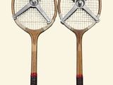 two tennis racquets that are on a white background