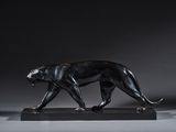 an image of a statue of a black panther on a black base