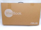 a cardboard box with a logo on it on a white surface