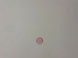 three red circles in the sky above a white wall