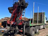 a truck that has a crane on the back of it