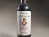 a bottle of wine that is sitting on a table