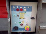 a machine that is sitting on the side of the street