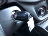 a close up of a car door handle with a key in it