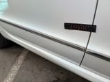 a sticker on the side of a car that says, i don ' t know what it is