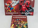 two marvel comics books on a white background