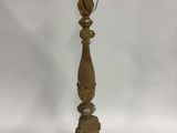 an antique brass table lamp with a black shade on top