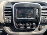 a car dashboard with a digital display in the center