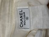chanel logo on the back of a chanel bag