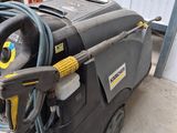 a machine that is sitting on the ground in the garage