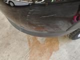 a reflection of a car on the side of a car