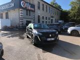 a car parked in front of a building in a parking lot