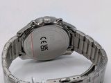a close up of a wrist watch on a white surface