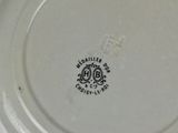 a white plate with a black and white design on it