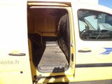 a yellow van with the door open and the driver ' s seat down