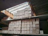 many stacks of wood stacked on top of each other
