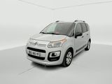 a white citrole is parked in a white room