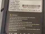 a close up of a cell phone battery with a barcode on it