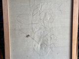 an image of a picture of a painting on a easel with a lot of writing on it