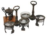 a group of antique items that are sitting on a table