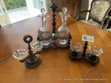a table with a lot of glass items on it