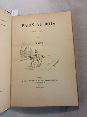 an open book with a drawing of a man riding a horse