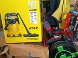 a box of tools sitting on top of a pile of boxes