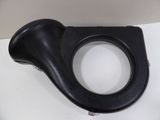 a close up of a black object on a white surface